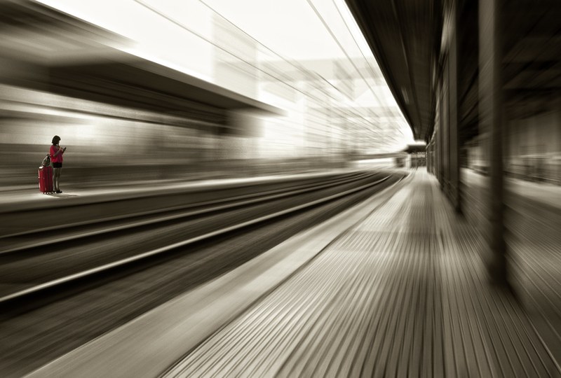 Woman waiting on a train platform